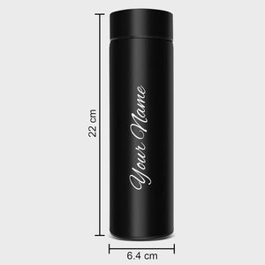Black stainless steel bottle with "Your Name" engraved in cursive, measuring 22 cm in height and 6.4 cm in diameter.