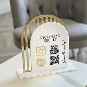 Elegant acrylic QR code social media sign with custom logo and mirror stand, perfect for businesses like restaurants, salons, and retail stores.
