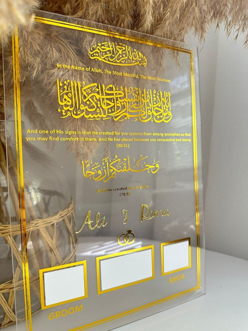 Elegant Islamic wedding acrylic board with gold Arabic calligraphy, fingerprint signature boxes, and intricate detailing, making it a perfect Nikah contract display piece