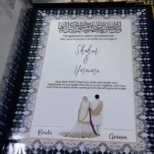 Open customized Nikah velvet book kit with "Shaheer & Umaima" text, featuring Islamic calligraphy, floral designs, and a bride and groom illustration, held by a hand