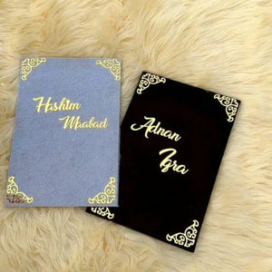 A luxurious Personalized A4 Nikah Certificate Book in black and white, featuring gold calligraphy and ornate corner designs, perfect for Islamic wedding ceremonies.