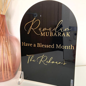 Ramadan Acrylic Sign displaying "Ramadan Mubarak" in gold with a sleek, modern acrylic finish, perfect for Ramadan home decoration.
