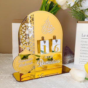 Elegant Ramadan Countdown Calendar displayed on a table with yellow tulips and other decorative elements.