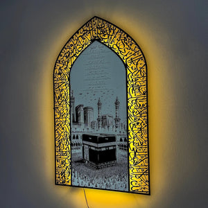 Ramadan wall decor featuring illuminated Islamic wall art with Arabic calligraphy, Kaaba illustration and warm LED lighting, elegant Islamic home decor.