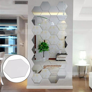 Silver acrylic hexagon wall decor mirror with a reflective finish, displayed on a bedroom wall above a bed