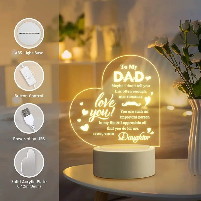 Heart-shaped LED lamp with an engraved heartfelt message, 'To My Dad,' featuring a glowing acrylic plate and a sturdy ABS light base. USB-powered with button control for easy use, this personalized lamp is an ideal gift from a daughter to her father, expressing love and appreciation. Perfect for Father's Day, birthdays, or any special occasion.