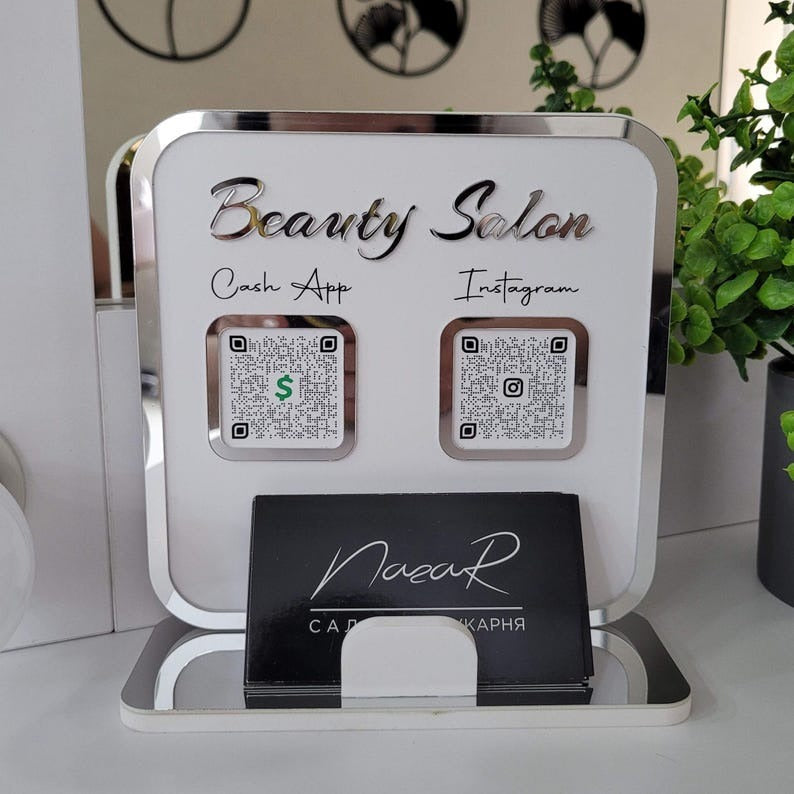 sleek and modern Beauty Salon QR Code Business Card Holder with a mirrored silver finish, featuring QR codes for Cash App and Instagram.
