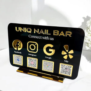 Premium acrylic QR code business display sign with gold text and icons, perfect for salons, cafes, and retail shops to enhance social media presence.