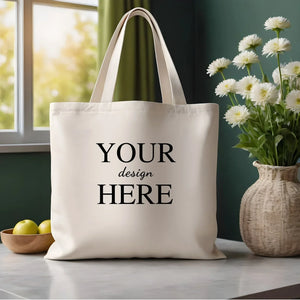 Canvas tote bag with a customizable design, styled with vibrant flowers in a minimalistic indoor setting.