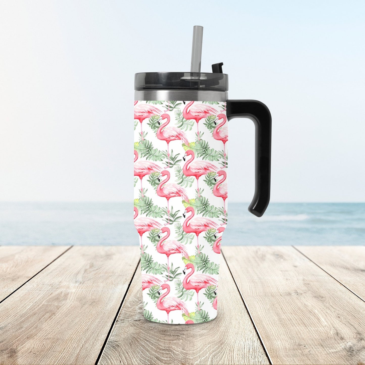 Eco-friendly stainless steel travel mug with a tropical flamingo print, perfect for outdoor and everyday use