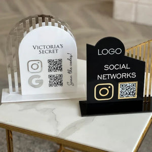 Sleek black and white personalized social media QR code display for businesses, perfect for modern branding and connecting customers to Instagram and other digital platforms.