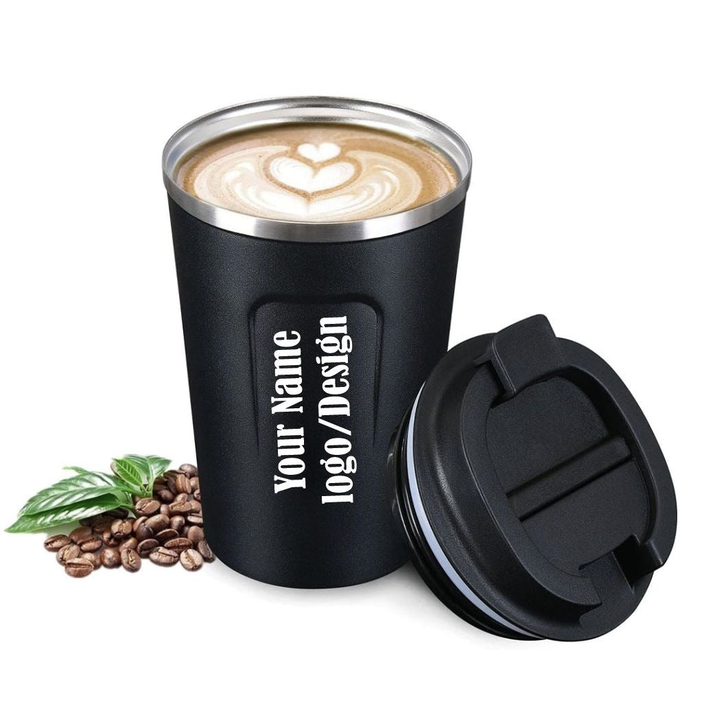 Black stainless steel personalized coffee mug with a custom engraved name/logo, featuring a spill-proof lid and coffee beans.