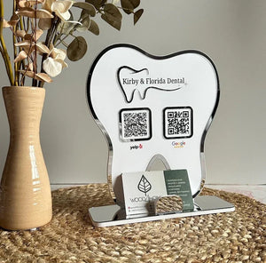 Custom tooth-shaped dental office sign with QR codes for Yelp and Google reviews, featuring a sleek silver and white design.