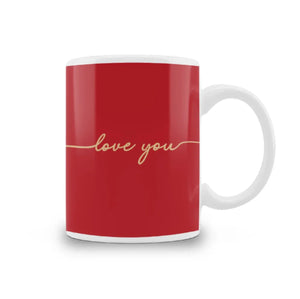 Red ceramic mug with a gold 'love you' script, featuring a white handle—an ideal romantic gift for couples, anniversaries, or Valentine's Day.