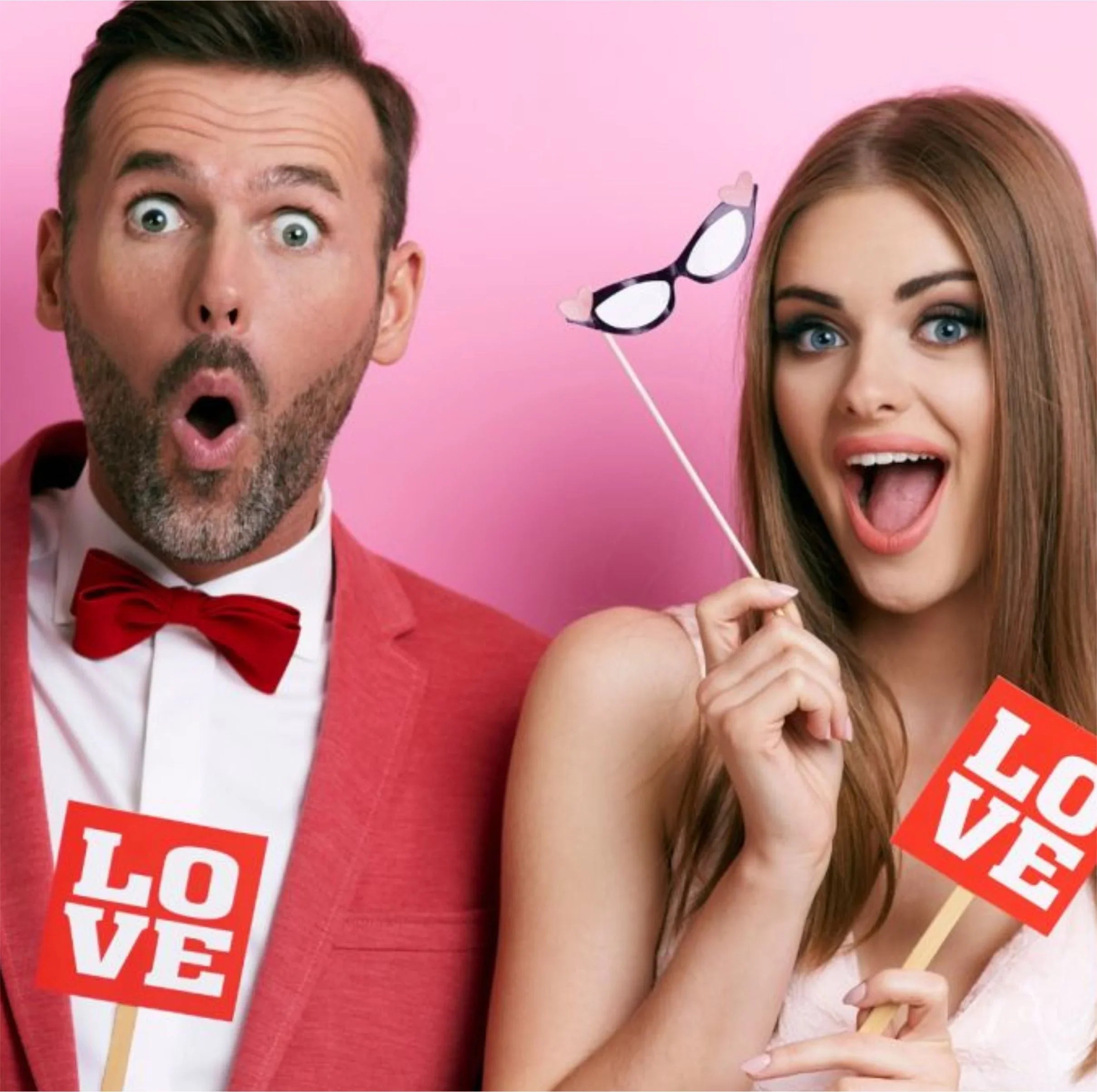 Happy couple with LOVE signs and heart glasses, perfect for Nikah or Valentine's gifts