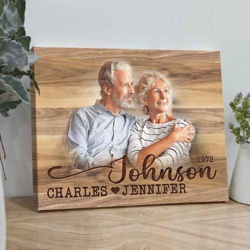 Custom wooden photo frame with engraved names & year, perfect for anniversary gifts