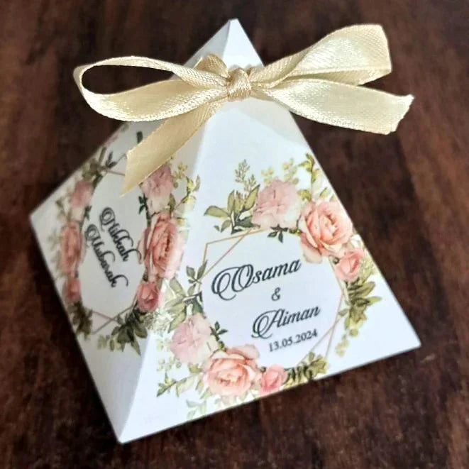 Customized floral wedding favor box with gold ribbon, personalized for Osama & Alman, perfect for Nikah gifts