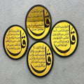 4 Qul frame wall decor featuring Islamic calligraphy in gold and black, elegant oval wall frames with Surah Ikhlas, Falaq, Nas and Kafirun for Islamic home decoration.