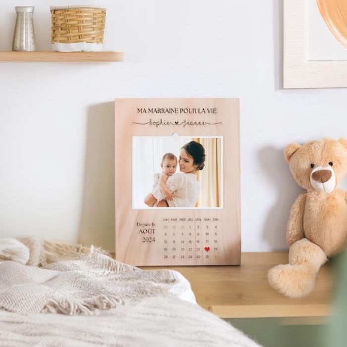 Personalized wooden photo calendar frame with the inscription for mother showcasing a heartfelt picture of a mother and baby. Includes a customizable name section, date starting from  a calendar design with a red heart marking a significant day. Ideal for celebrating meaningful relationships and preserving cherished memories