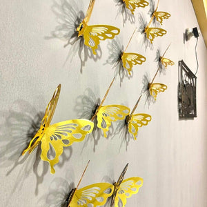 DIY 3D acrylic mirror butterflies wall decor with a reflective finish, displayed on a bedroom wall above a bed