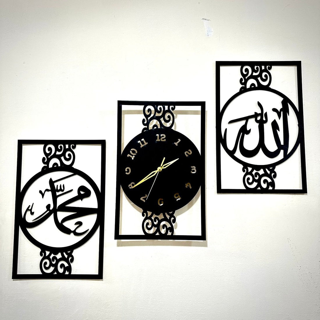 Islamic Allah Muhammad (SAW) calligraphy wall clock with Arabic design, displayed in a prayer room with a rug