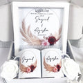 Luxury personalised couples hamper with 8x8 inch frame, 2 custom mugs, and white roses, packaged in a box.