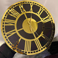 Majestic Roman clock with Roman numerals in 2-layer acrylic and MDF, displayed on a white wall