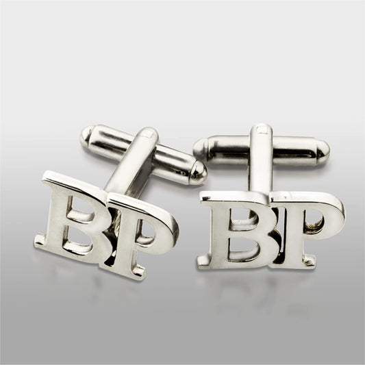 Personalized silver cufflinks with "BP" initials engraving, displayed on a gradient gray background