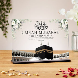 Elegant Umrah Mubarak acrylic plaque with Kaaba design, floral accents, and Arabic calligraphy. A custom Islamic gift for Hajj, Ramadan, or Eid celebration.