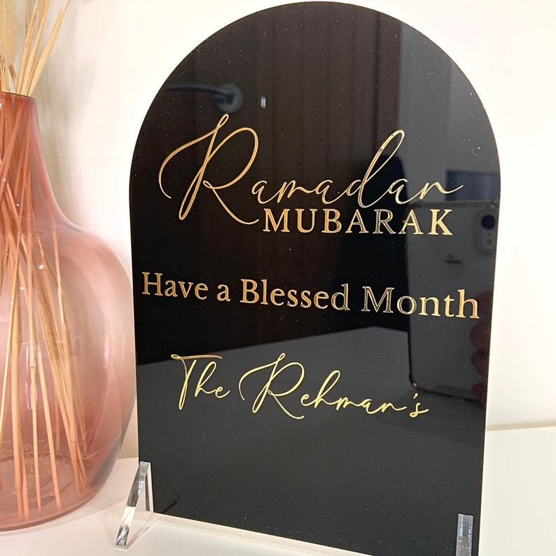 Ramadan Acrylic Sign displaying "Ramadan Mubarak" in gold with a sleek, modern acrylic finish, perfect for Ramadan home decoration.