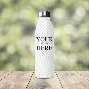 Custom stainless steel water bottle with 'Your Design Here' text displayed on a wooden surface and a green blurred background.