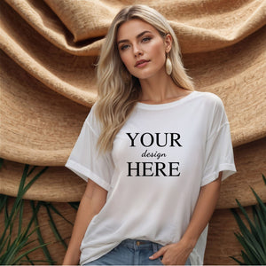 Customized t-shirt with a printed design that reads 'Your Design Here,' displayed on a model wearing jeans against a woven texture backdrop