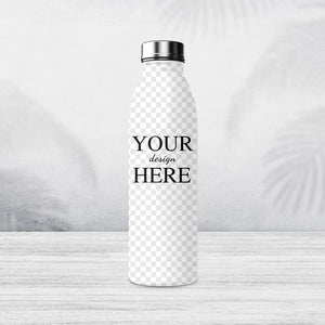 Custom stainless steel water bottle with 'Your Design Here' text displayed on a wooden surface with a serene ocean backdrop.