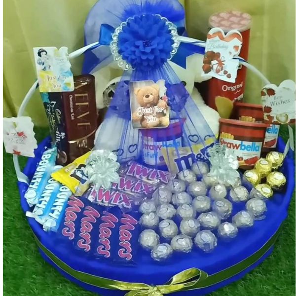 Blue Basket with Mars, Twix, teddy bear, and birthday cards