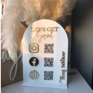 Custom acrylic social media sign with QR codes and gold lettering, designed for business branding.