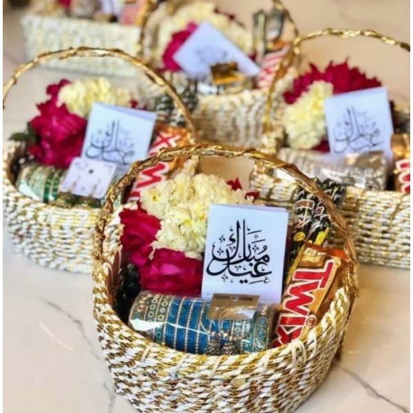 Eidi Gift Baskets with artificial gajras, flowers, and gifts on display