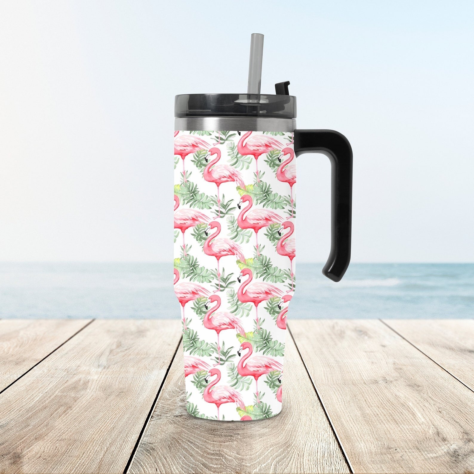 Eco-friendly stainless steel travel mug with a tropical flamingo print, perfect for outdoor and everyday use